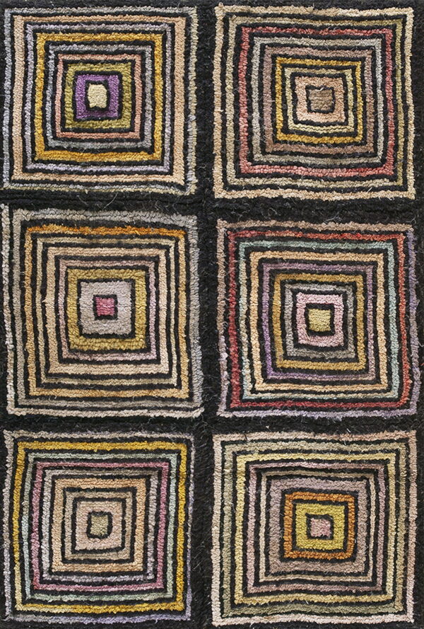 High-pile rug featuring a grid of six blocks with black lines and multicolored concentric squares.