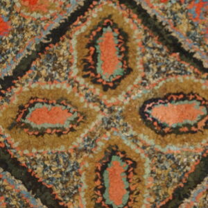Colorful antique hooked rug design.