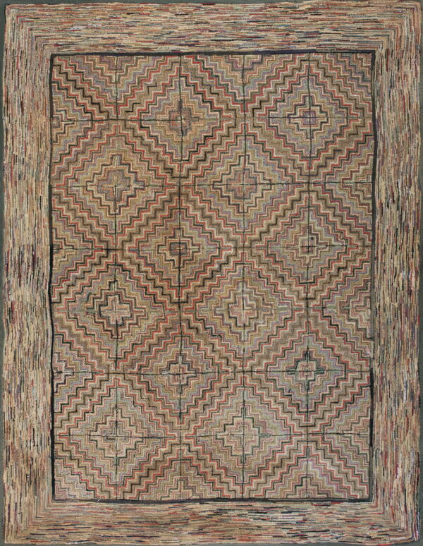 Muted multi-colored rug with a complex stepped geometric field pattern and a wide textured strip border.