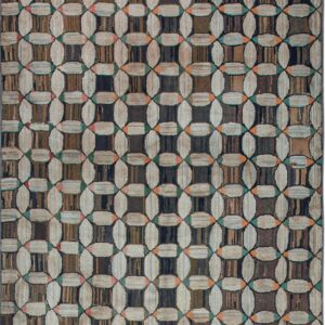 High-texture rug with brown and cream interlocking oval pattern placed on gray plank wood flooring.