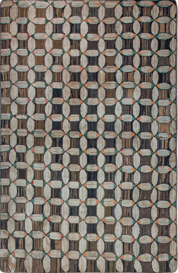 High-texture rug with brown and cream interlocking oval pattern placed on gray plank wood flooring.