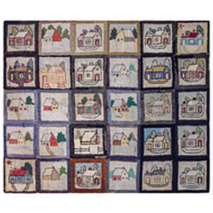 A close-up of a nubbly, multicolor rug featuring folk art house designs inside black-bordered squares.