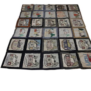 Multicolored patchwork rug with dark grid borders and squares showing stylized houses and campers.