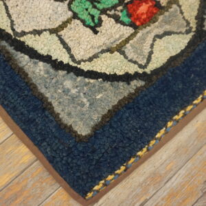Blue antique rug with floral design