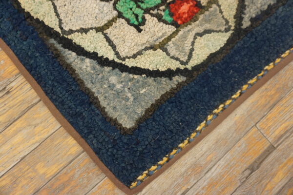 Blue antique rug with floral design