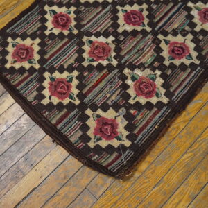 Colorful floral patterned hooked rug