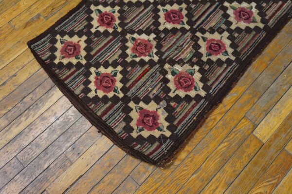 Colorful floral patterned hooked rug