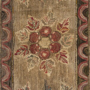 Muted brown and red hooked rug with a central flower cluster and repeating scalloped border design.