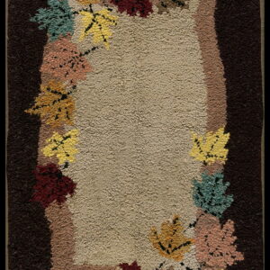 Autumn leaves on textured background rug.