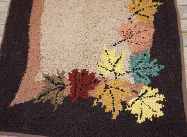 Colorful autumn leaves on textured rug