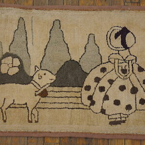 Beige folk art rug showing a polka-dot figure and a lamb in a gray and brown wooded setting.