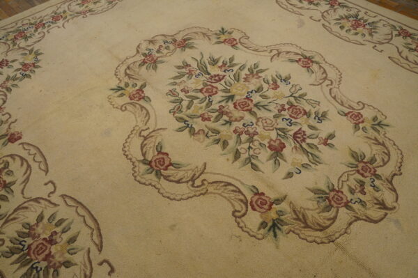 Floral design on vintage rug.