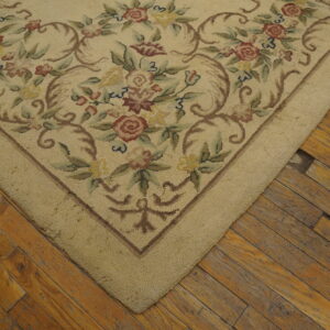Floral design on vintage hooked rug