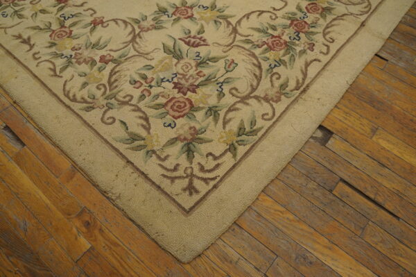 Floral design on vintage hooked rug
