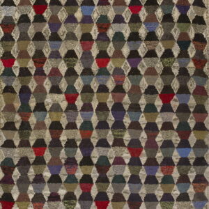 Textured rug with a multicolored, repeating pattern of dark geometric shapes separated by light, shaggy diamonds.