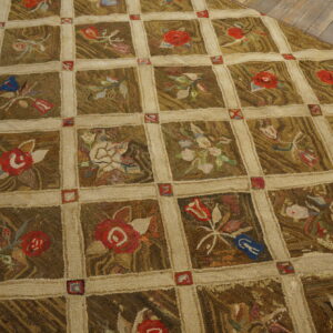 Earth-toned, high-texture rug featuring a beige trellis pattern and colorful floral squares on wood flooring.