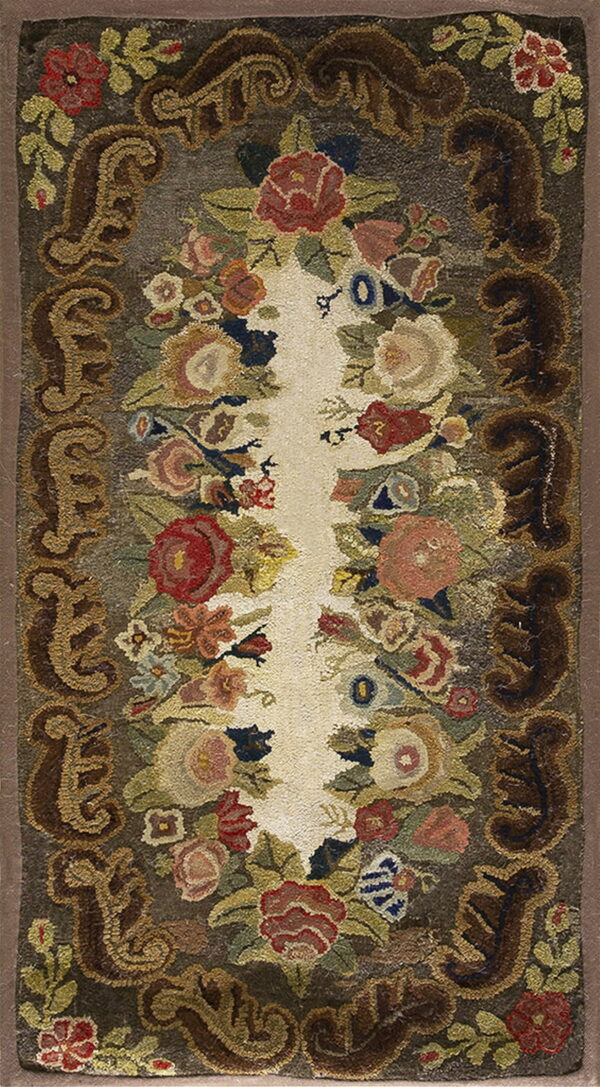 Highly textured rug with multicolored floral bouquets, dark brown scrolling border, and a vertical cream center.