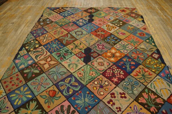 Highly colorful, textured rug featuring unique floral motifs within a diamond grid on rustic wood flooring.