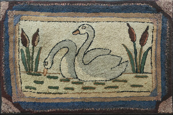 Highly textured beige rug with a pond scene pattern showing two gray swans and brown cattails.
