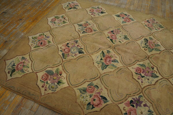 Floral lattice rug in tan and cream with pink and purple flowers on rustic wood planks.