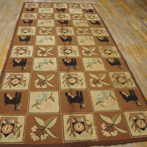 Brown, cream, and black checkered rug with animal and floral patterns lies on light wooden floorboards.