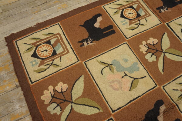 Looped pile rug with brown and beige squares containing stylized botanical and black animal motifs on rustic wood flooring.