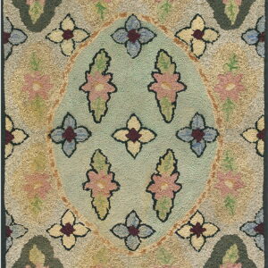 Textured rug featuring a pale aqua oval medallion surrounded by pink, olive, cream, and blue floral patterns.