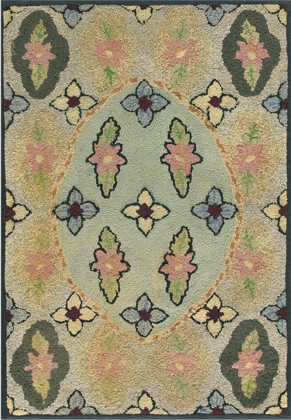 Textured rug featuring a pale aqua oval medallion surrounded by pink, olive, cream, and blue floral patterns.