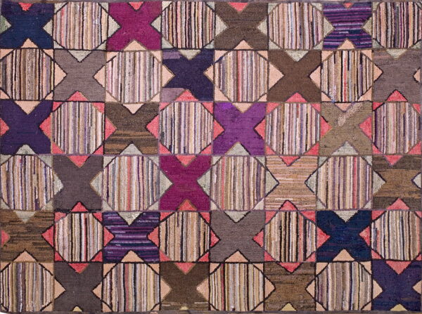 Geometric grid rug featuring multi-colored vertical stripes framed by purple, brown, and magenta x blocks.