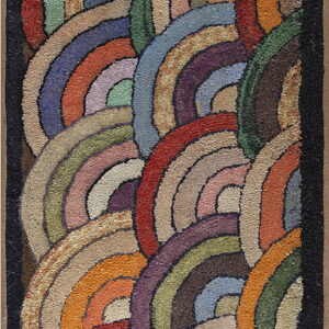 Colorful textured rug featuring dense, overlapping semicircles in varied earthy and jewel tones.