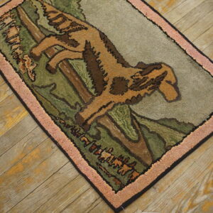 Textured rug showing a tan animal climbing a tree; green, gray, and pink colors on weathered wood planks.