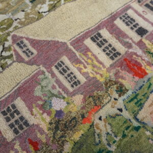 High-pile scenic rug featuring a maroon house, green trees, and a spotted white animal.