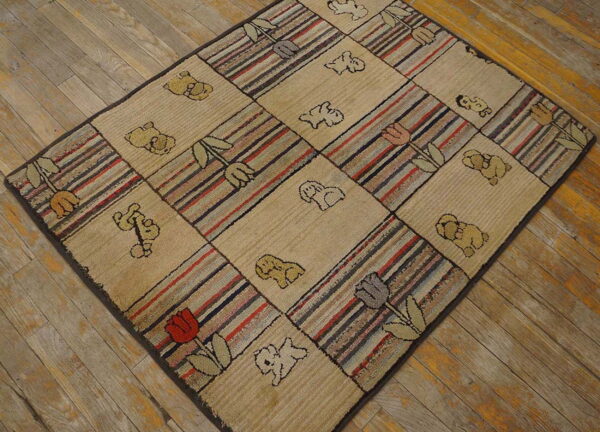 Checkerboard rug featuring beige animal designs and multi-color striped blocks, lying on worn wooden floorboards.