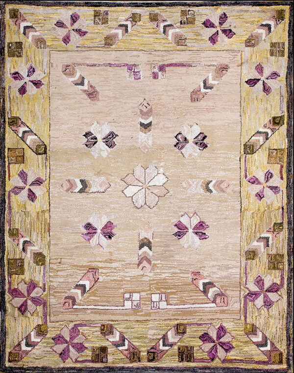 High-texture beige rug featuring stylized purple flowers and chevrons within a distressed yellow border.