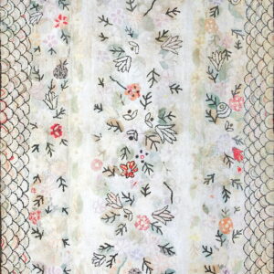 A cream rug with scattered light floral motifs bordered by a distinct black scallop scale pattern.