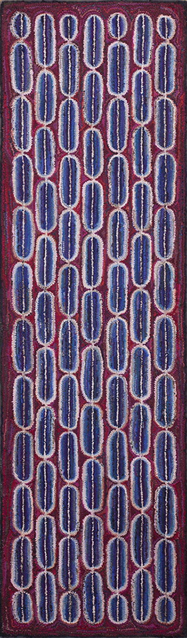 Deeply textured blue and white vertical capsule shapes repeat densely across a maroon and dark red runner rug.