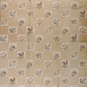 Checkerboard rug in tan and cream squares featuring anchors, roosters, floral, and house motifs.