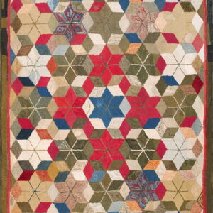 Multicolor textured rug with a dense geometric pattern of three-dimensional cubes and repeating six-pointed stars.