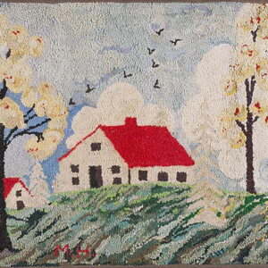 Hooked rug depicts a naive spring landscape with white houses, red roofs, blooming trees, and green hills.