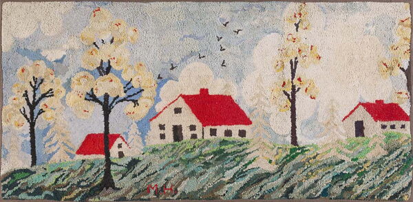 Hooked rug depicts a naive spring landscape with white houses, red roofs, blooming trees, and green hills.