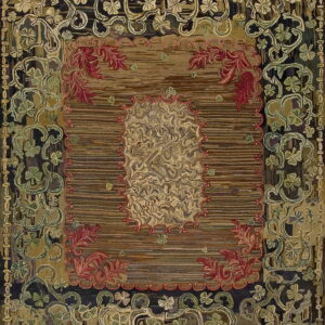 Highly detailed, textured rug featuring a brown striped center bordered by dark green and red stylized foliage.