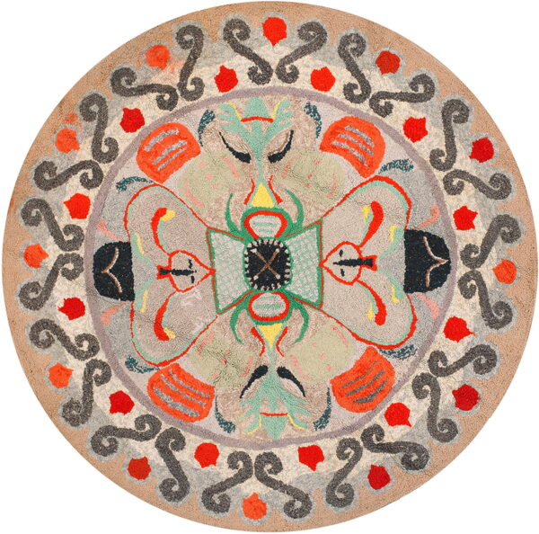 Textured round rug with a beige field, colorful red, green, and orange abstract designs, and a charcoal scroll border.