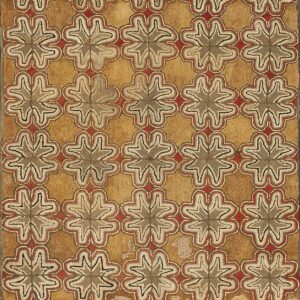 Textured tan rug with repeated star-like motifs outlined in red, gray, and cream colors.