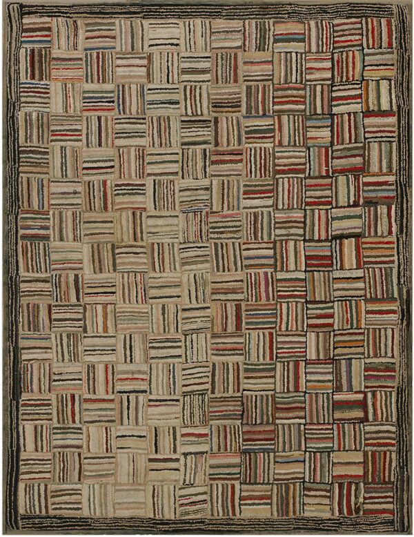 Rustic, textured rug with multicolored striped blocks forming a patchwork grid and a thick dark striped border.