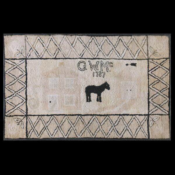 Textured off-white rug with a black horse, gwm 1787 inscription, and a dark diamond border pattern.