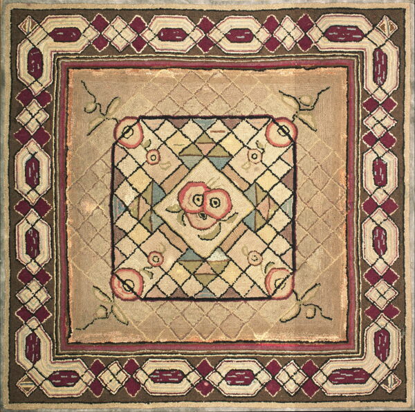 Tan square rug featuring a floral center surrounded by concentric borders with maroon and brown geometry.