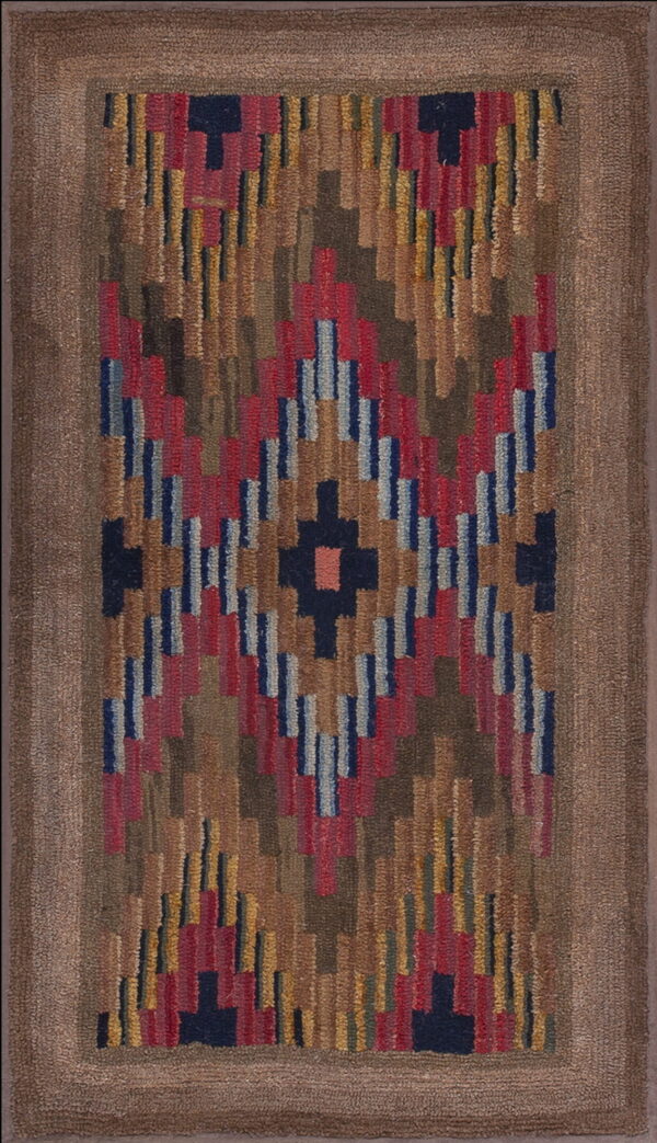 Rustic hooked rug with a central diamond motif made of multicolored geometric blocks on an earth-toned background.