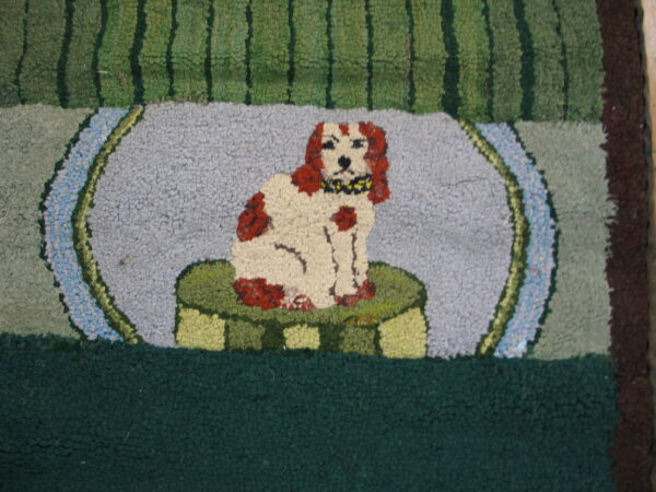 Textured rug depicting a spotted white and red dog on a pedestal against a striped green and blue background.