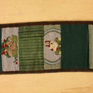 A hooked rug runner on wood flooring features green, gray, and brown panels with dog and floral motifs.