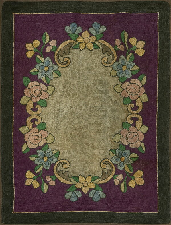 Plum rug featuring a low-pile floral medallion design in tan, pastel pink, blue, and yellow with a dark border.